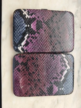 Cartera Stradivarius efecto piel serpiente