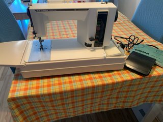 Máquina de coser Singer con maletín