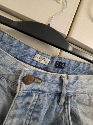 Jeans uomo strappati