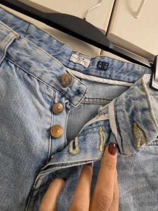 Jeans uomo strappati