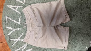 Pantalones cortos beige con cordón