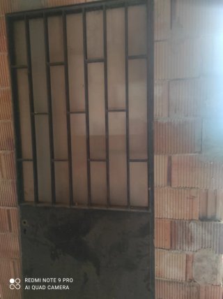 Reja de ventana metálica 1x1.15m Puerta 90x220 apr