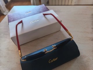 Occhiali da sole Cartier oro e rossi