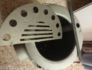 Estufa de leña metálica gris