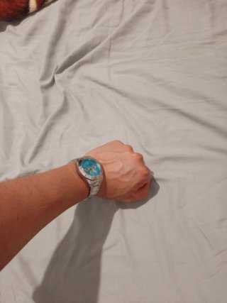 Reloj  Rolex con numeros arabe