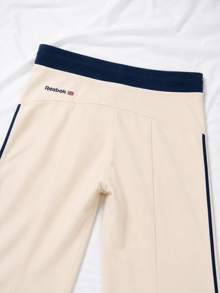 Reebok Pantalón de chándal beige con rayas