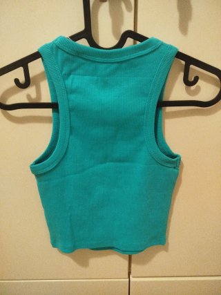 Top sin mangas turquesa talla XS