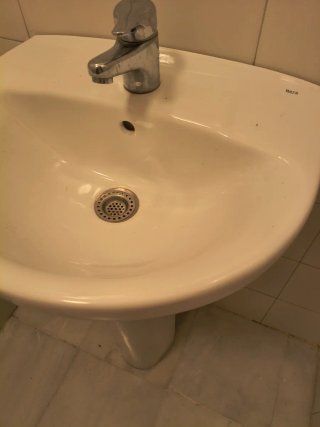 Lavabo de porcelana blanco