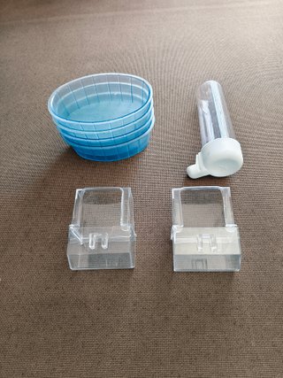 Jaula sin estrenar compuesta de 4 bañeras, nido,