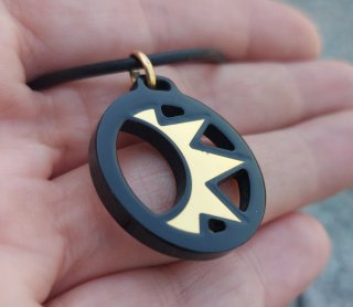 Ciondolo oro giallo 750 nero e oro