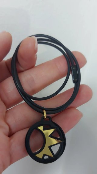 Ciondolo oro giallo 750 nero e oro