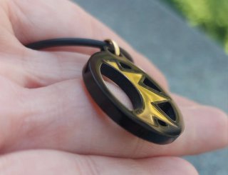 Ciondolo oro giallo 750 nero e oro