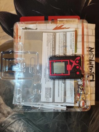 Digimon digivice x 20 aniversario negro y rojo