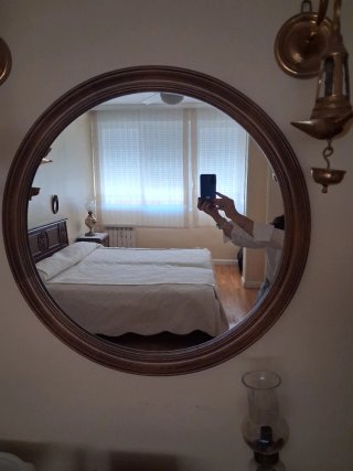 Dormitorio vintage madera y ratán