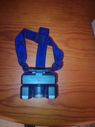 Linterna frontal LED azul