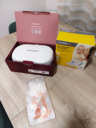 Momcozy M6 como nuevo + discos + bolsas