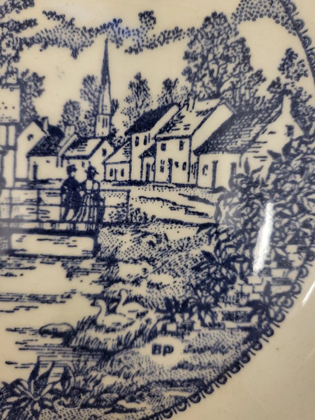 Plato de loza vintage escena rural