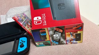 Nintendo switch con dos juegos