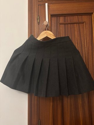 Falda plisada cris de paño