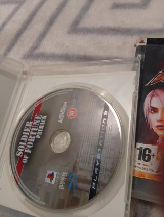 PlayStation 3 Negra + Mando y Cables + 2 Juegos
