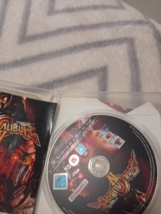PlayStation 3 Negra + Mando y Cables + 2 Juegos