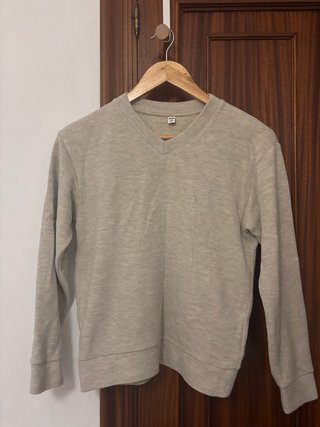 Jersey beige cuello V