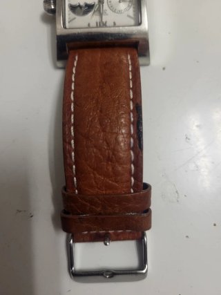 Reloj Marrón y Plateado