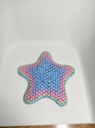 Estrela sensorial articulada arco-íris