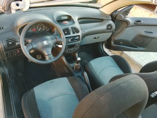 206 techo eléctrico, 100km 24años pero mimado