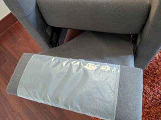 Sillón reclinable gris tela