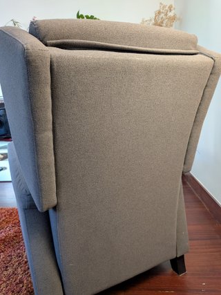 Sillón reclinable gris tela