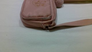 Bolso rosa y dorado Harry Potter