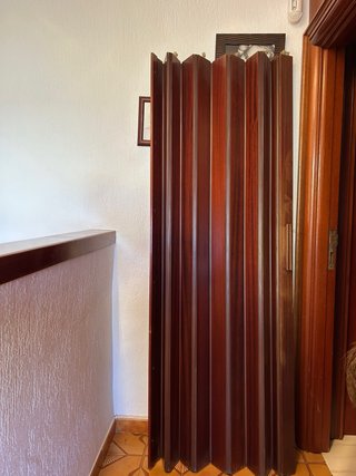 Puerta plegable de madera