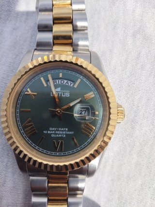 Reloj Lotus bicolor dorado y plateado