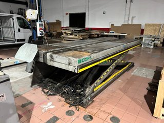 Elevador de coches para alineacion