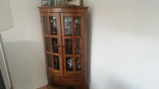 Mueble de teca para rincón
