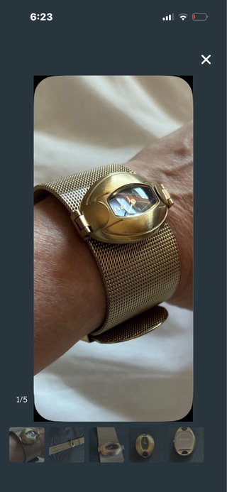 Reloj dorado de malla