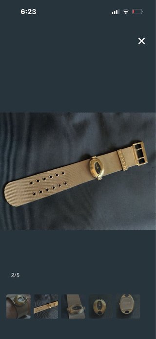 Reloj dorado de malla