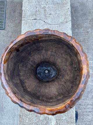 Antico vaso in terracotta con volto