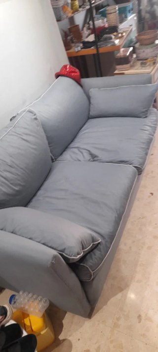 Sofá gris de tela