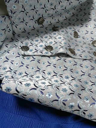 Chaleco fallero azul y plateado