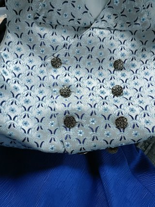 Chaleco fallero azul y plateado