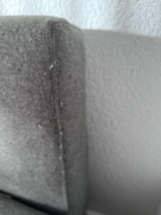 Sofá cama gris de tela