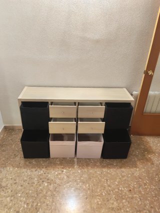 Scaffalatura Kallax Ikea con cassetti e cesti