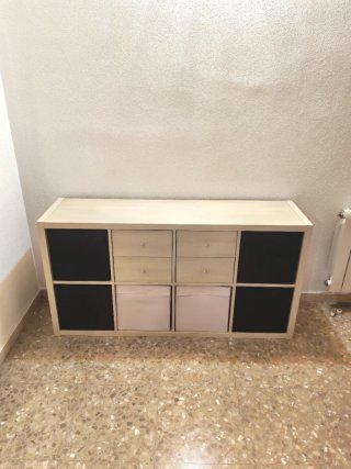 Scaffalatura Kallax Ikea con cassetti e cesti