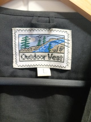 Gilet da pesca nero multitasche