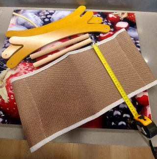 Cama para gato beige y marrón