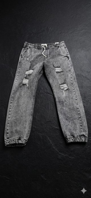 Pantalones vaqueros grises rotos