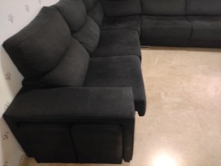 Sofá esquinero negro grande