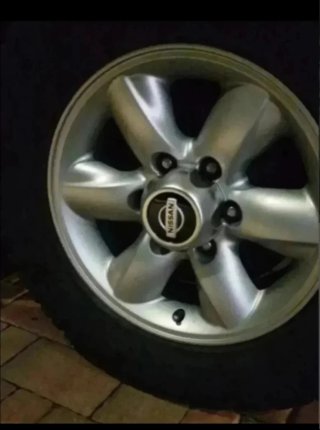 Tapabujes tapa cubos Nissan Terrano